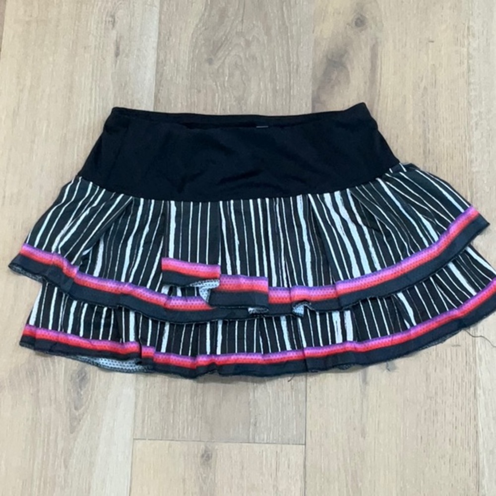 LUCKY IN LOVE TENNIS SKIRT